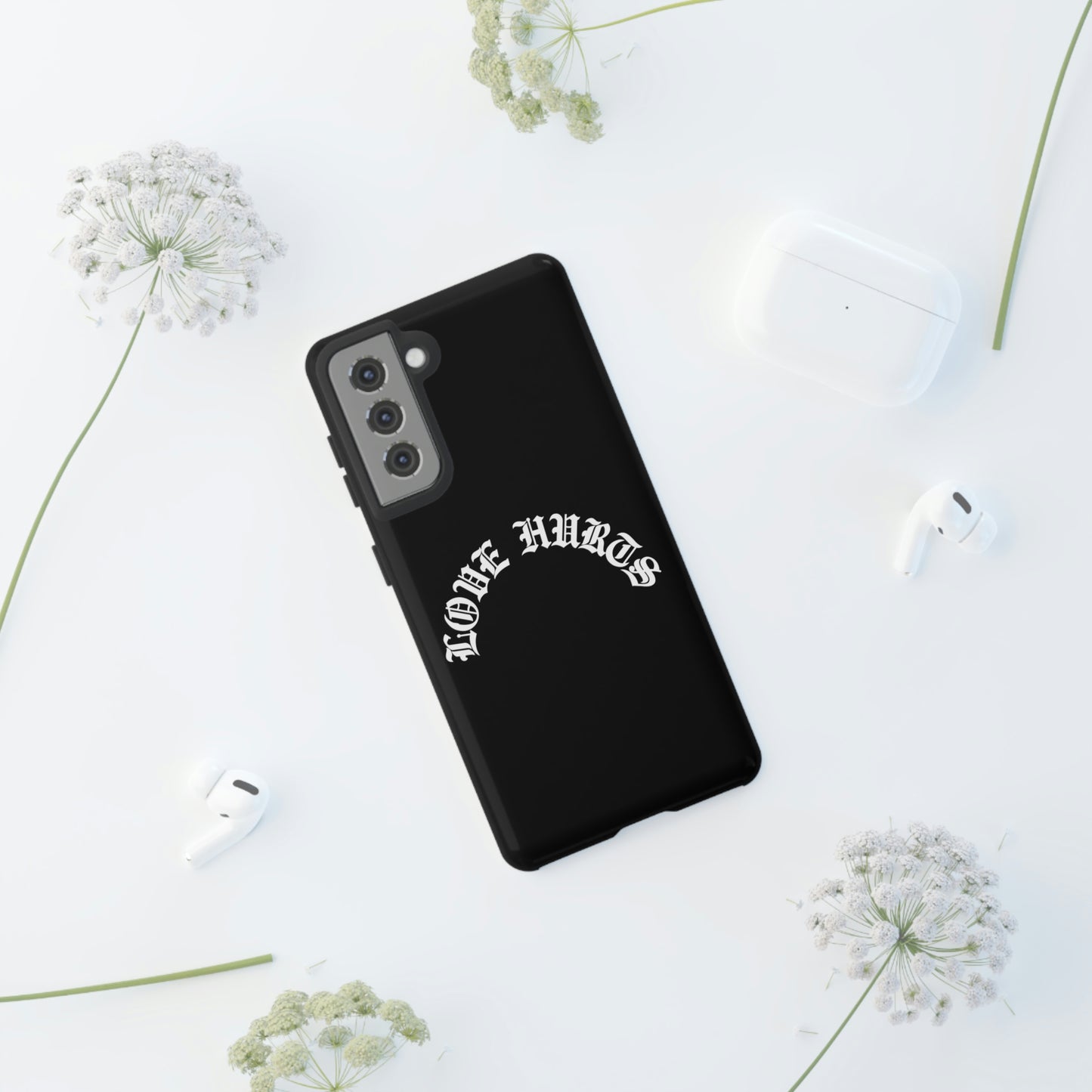 “LOVE HURTS” phone case