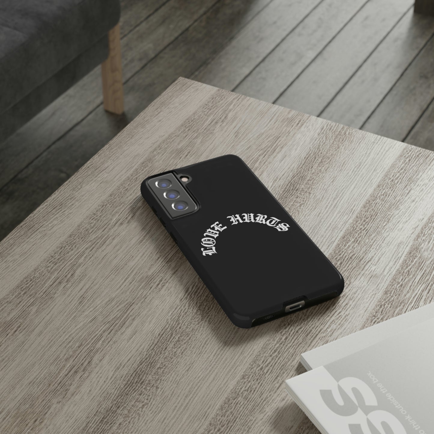 “LOVE HURTS” phone case