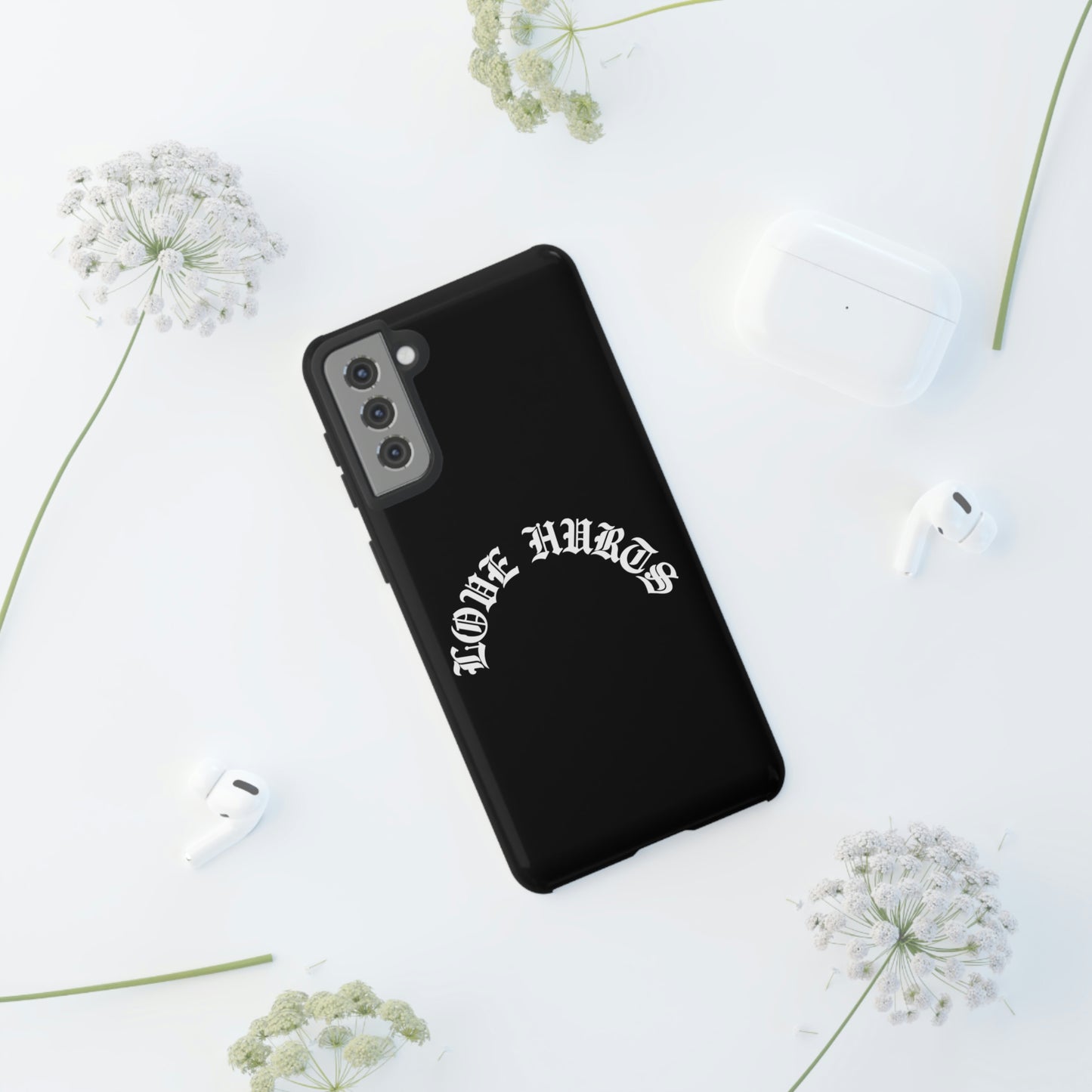 “LOVE HURTS” phone case